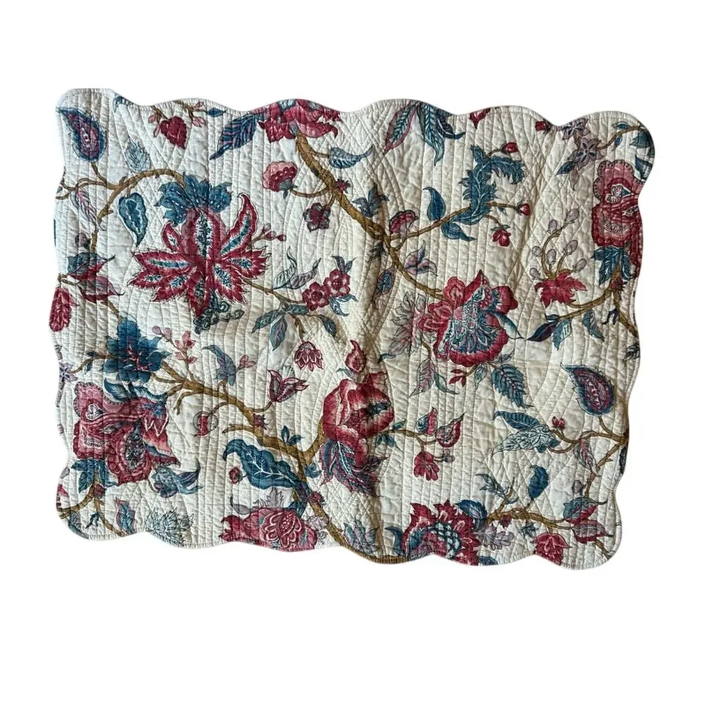2 quilted floral standard pillow shams from Pottery Barn ?